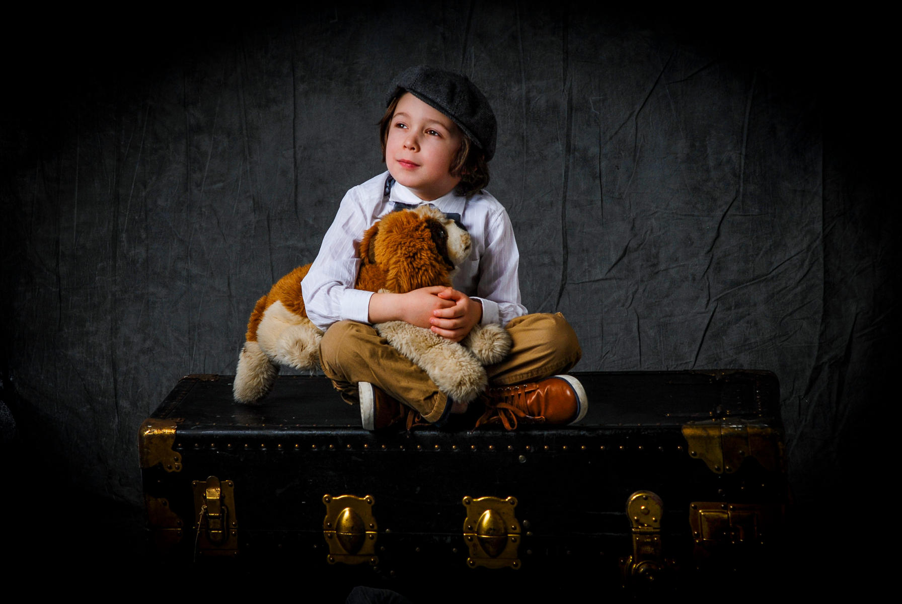 In photography studio the control of the lighting allows for the mood desired. Props can also be used to bring interest to the image. : Children : Wyckoff NJ Family Portrait Photographer